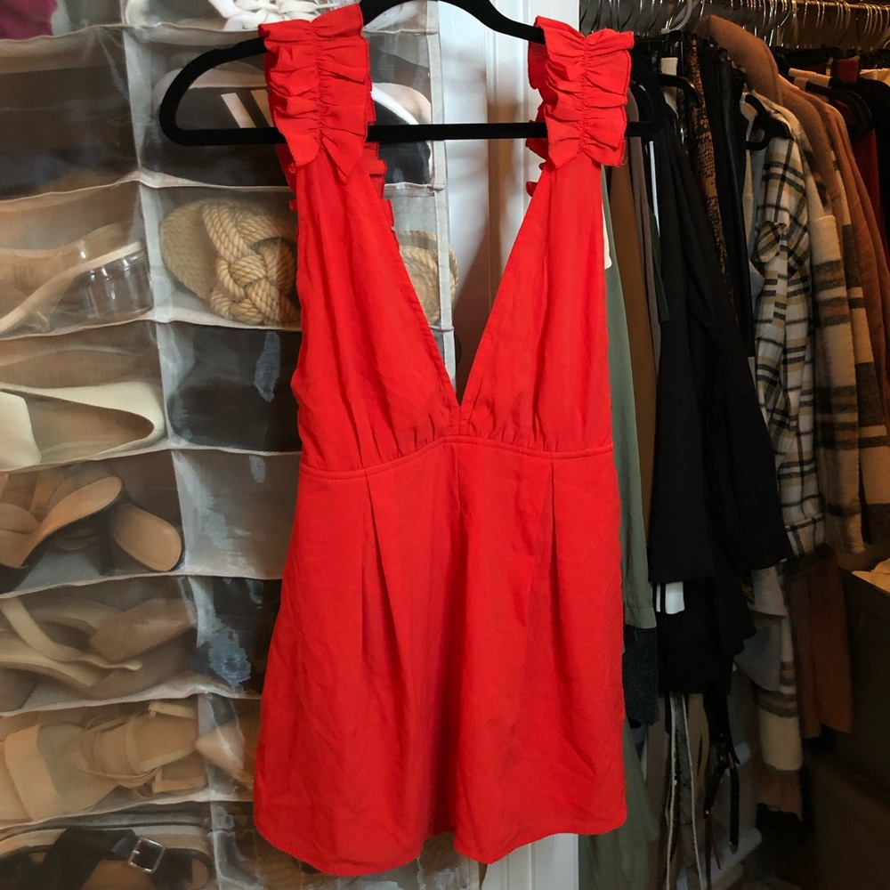 Red backless plunge romper